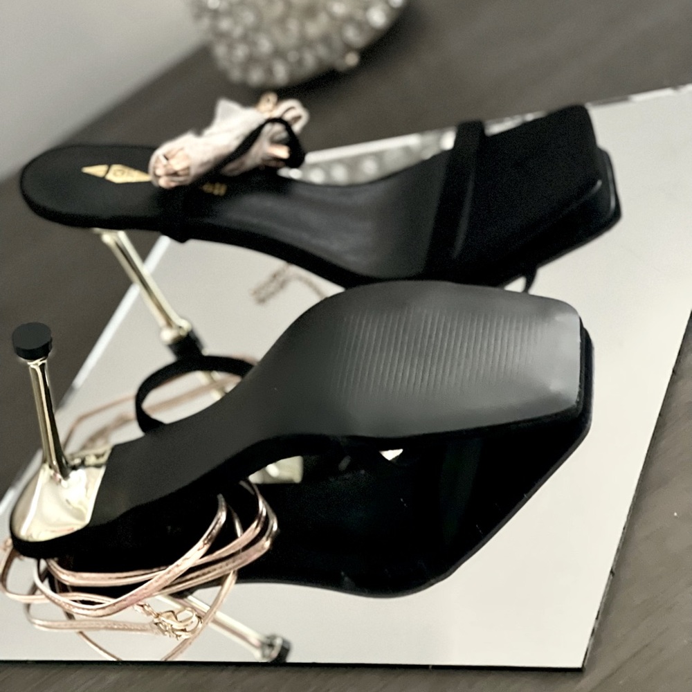 Size 8 black wrap around ankle heels